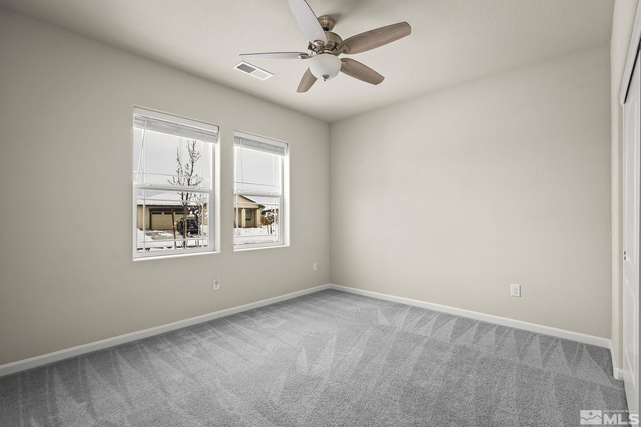 14420 Leiden Drive Reno, NV 89506 - Photo 12 of 16 a view of an empty room with a window
