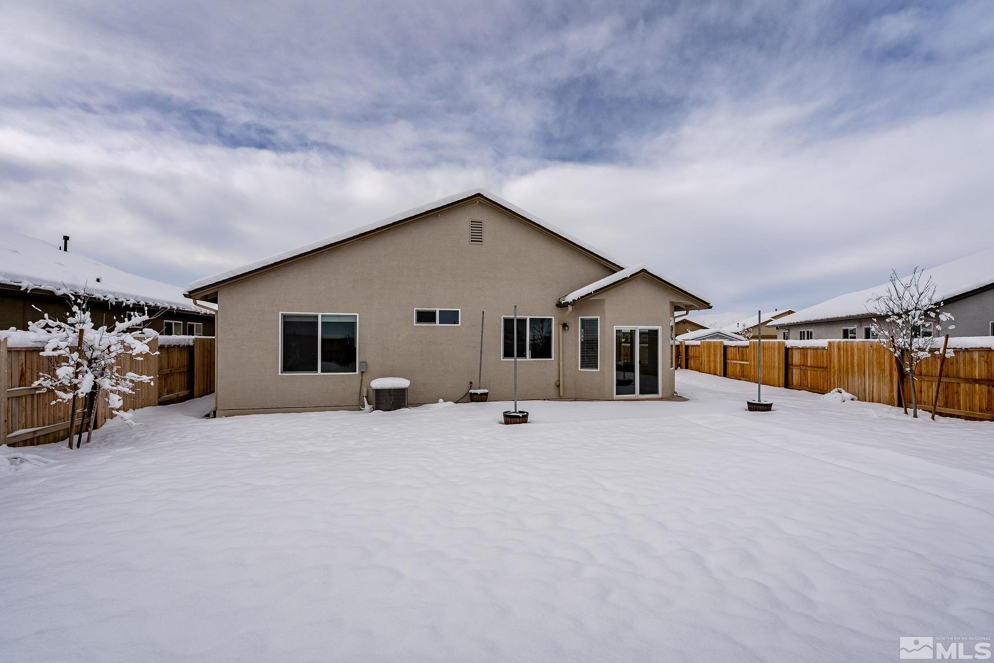 14420 Leiden Drive Reno, NV 89506 - Photo 16 of 16 a view of a house with a big yard and large trees
