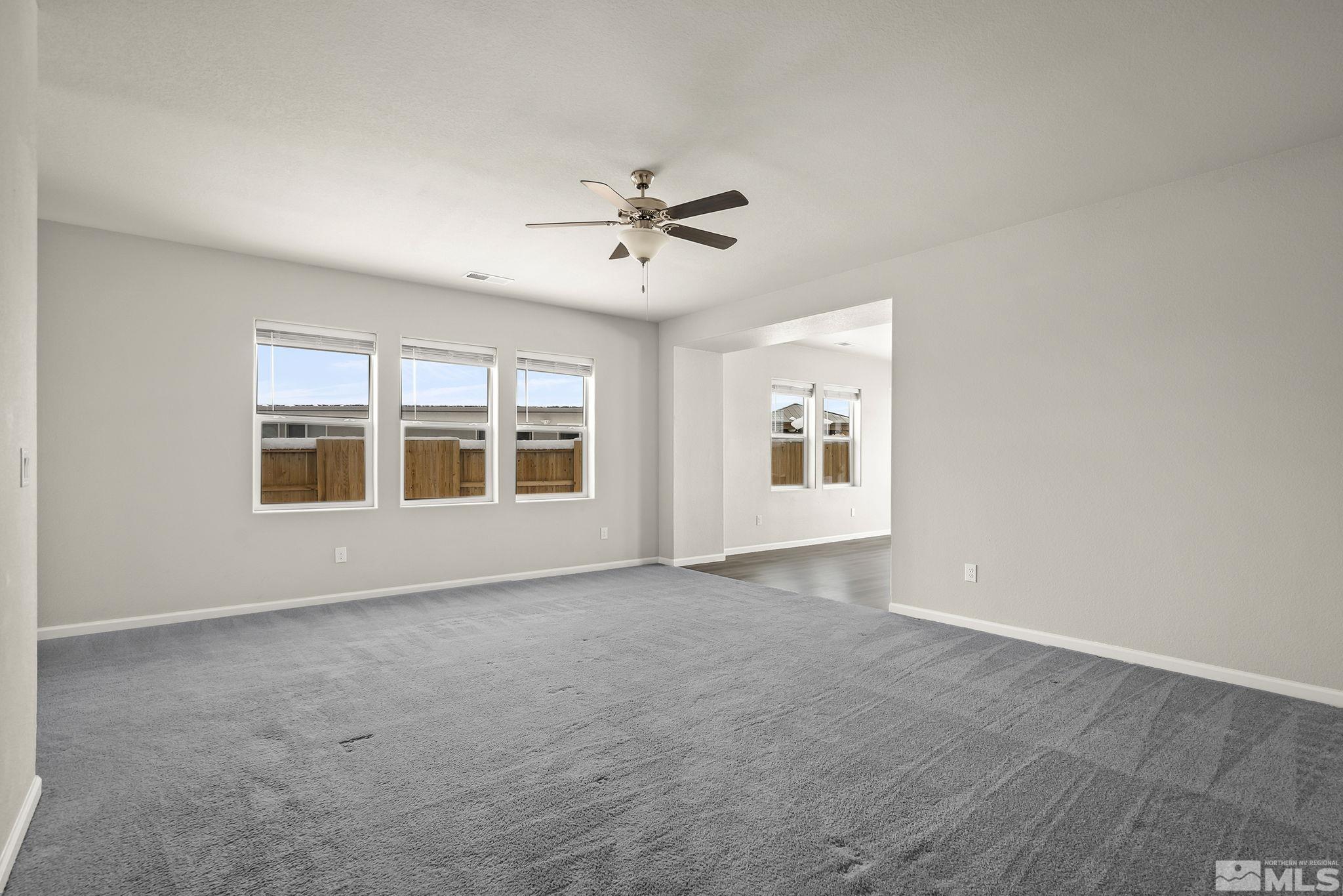 14420 Leiden Drive Reno, NV 89506 - Photo 5 of 16 a view of an empty room with a window