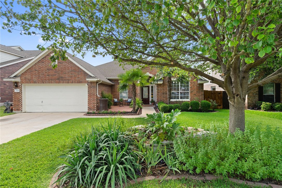 1708 Nelson Ranch Loop Cedar Park, TX 78613 - Photo 1 of 1 a front view of a house with yard and green space