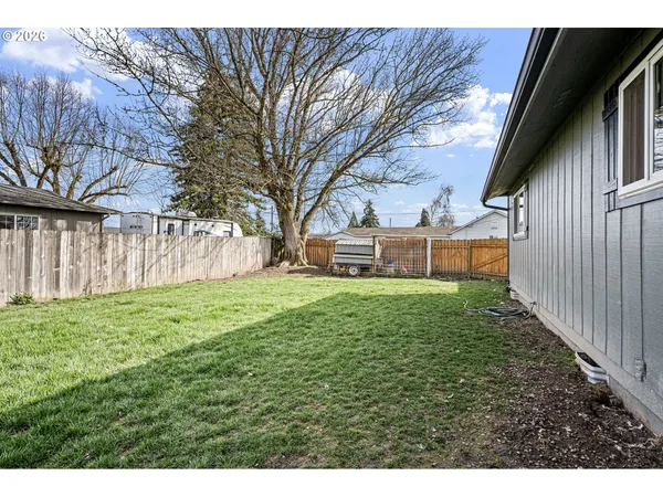 a view of a backyard with a garden