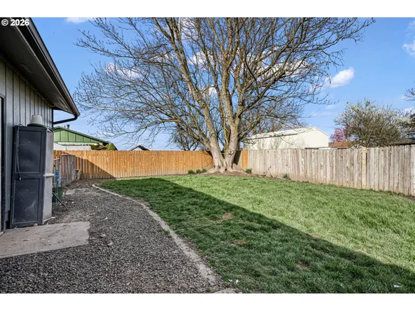 a view of backyard with green space