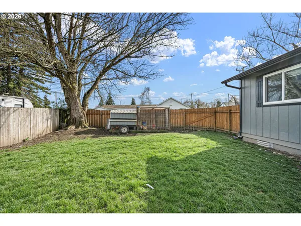 a view of backyard with green space
