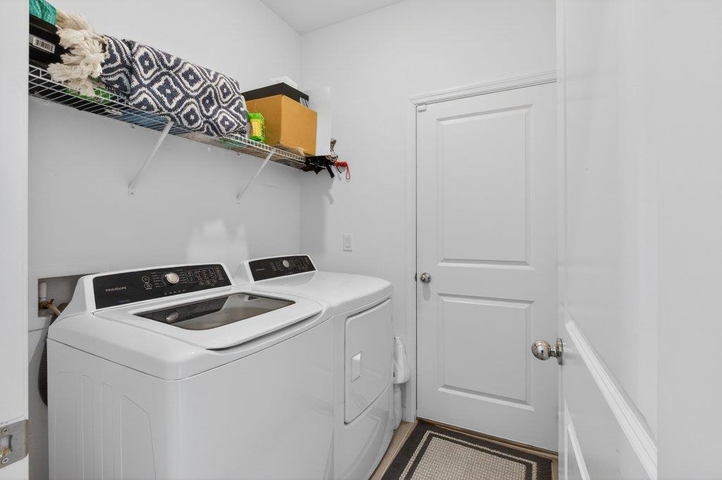 210 White Rabbit Run St. Augustine, FL 32092 - Photo 48 of 85 a utility room with dryer and washer
