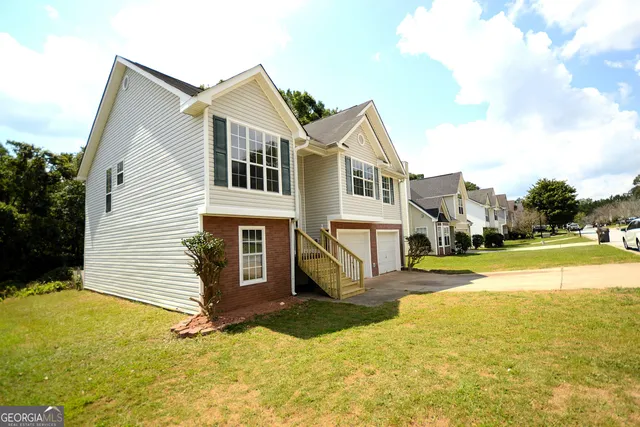 a view of a house with a swimming pool