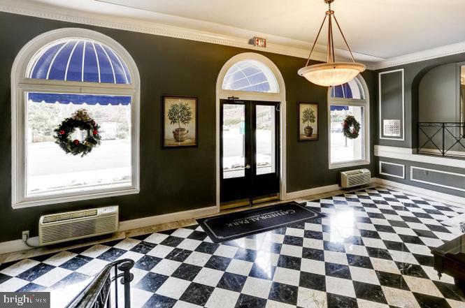 3100 Connecticut Avenue Northwest, Unit 419 Washington, DC 20008 - Photo 3 of 15 a bedroom with furniture and a window