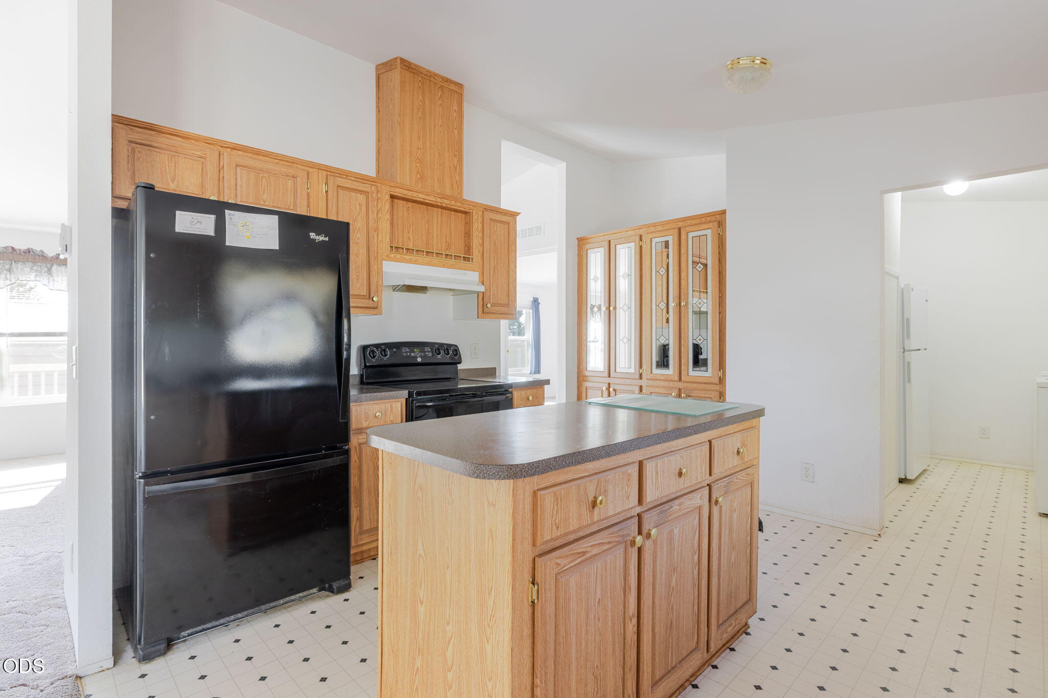 8628 Southwest Crater Loop Road Terrebonne, OR 97760 - Photo 15 of 36 a kitchen with stainless steel appliances a refrigerator and a sink