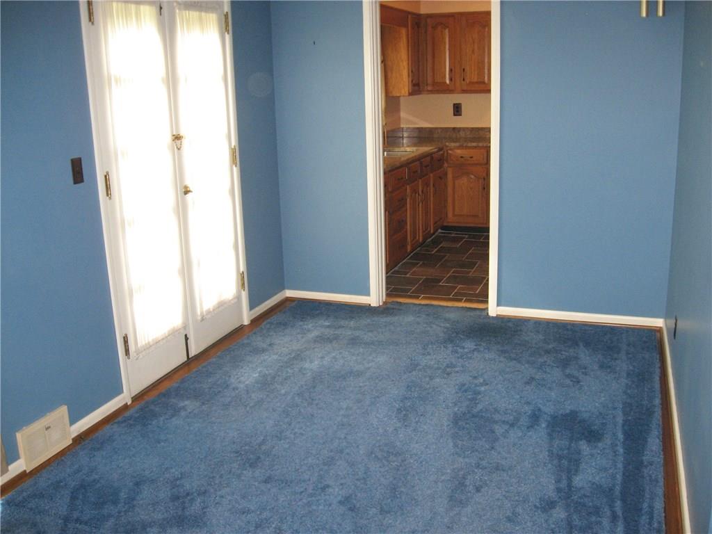 160 Braddock Rd Avenue Mount Pleasant, PA 15666 - Photo 12 of 24 Dining Room has hardwood floors, carpet easily removed.