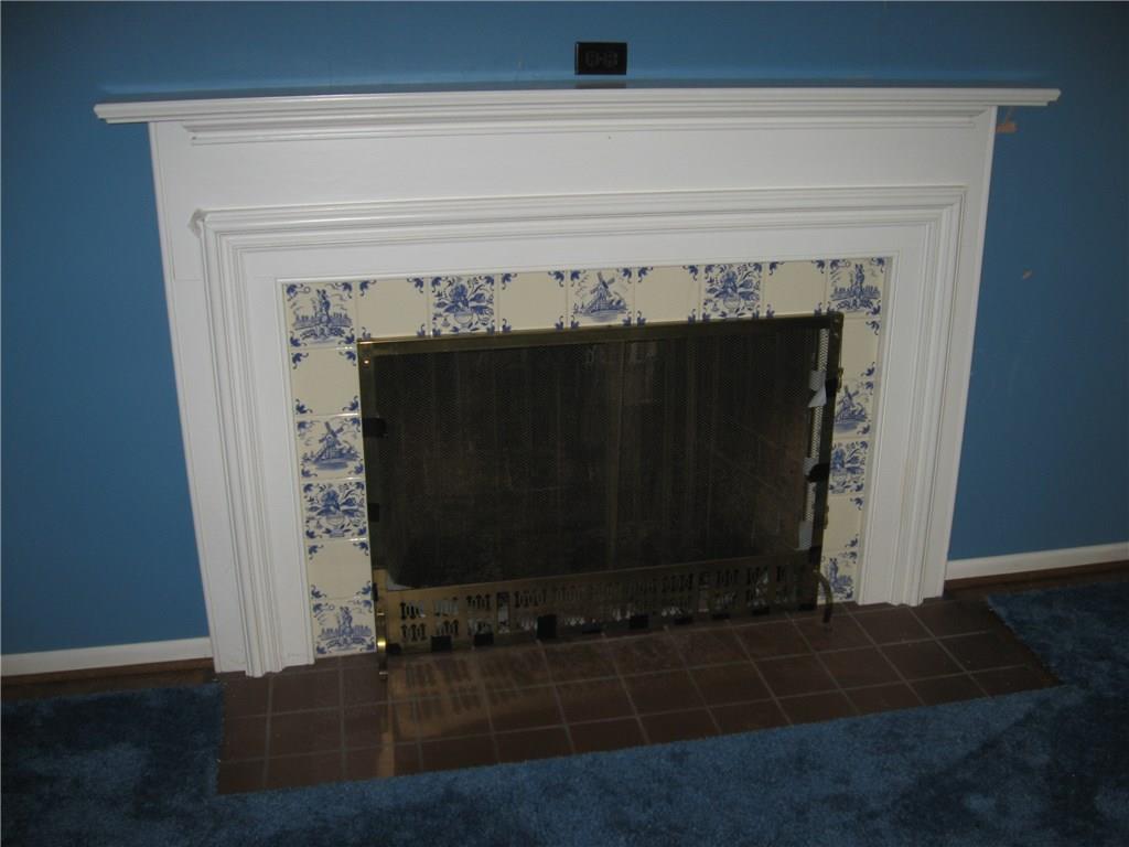 160 Braddock Rd Avenue Mount Pleasant, PA 15666 - Photo 13 of 24 Living Room fireplace, needs flue liner.