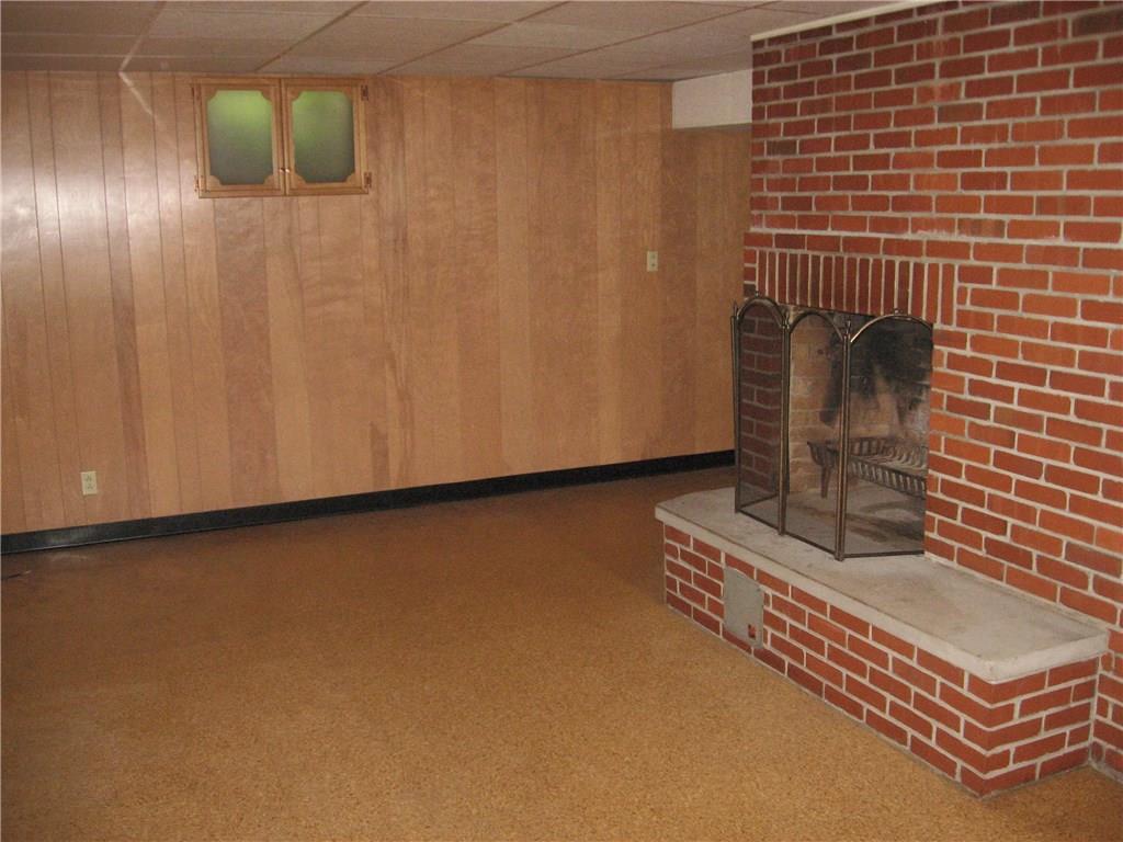 160 Braddock Rd Avenue Mount Pleasant, PA 15666 - Photo 19 of 24 Fireplace in Den used by the family.