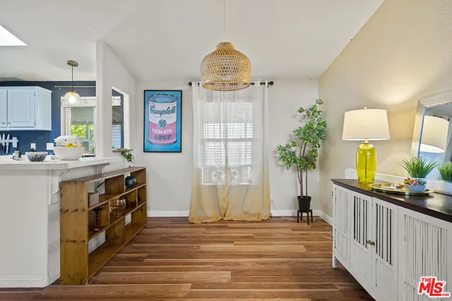 a kitchen with a sink cabinets and window