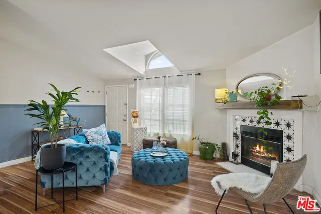 a kitchen that has a sink and a stove in it