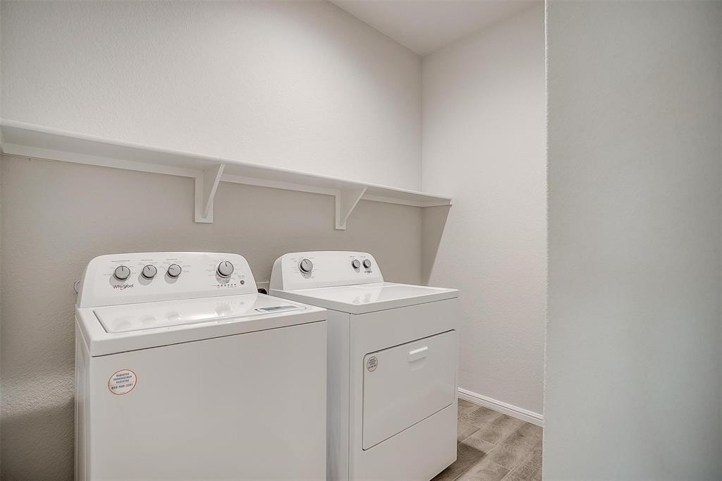 9721 Cherryville Road Fort Worth, TX 76108 - Photo 16 of 23 Laundry room with extra space. Washer and Dryer stay!