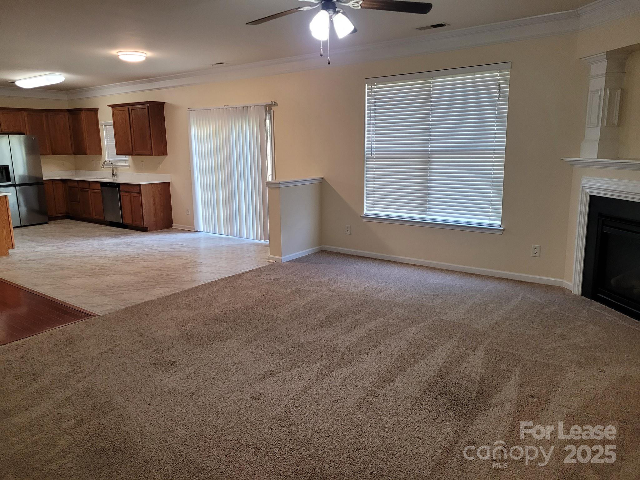13008 Rothe House Road Charlotte, NC 28273 - Photo 17 of 26 a view of kitchen and kitchen with furniture
