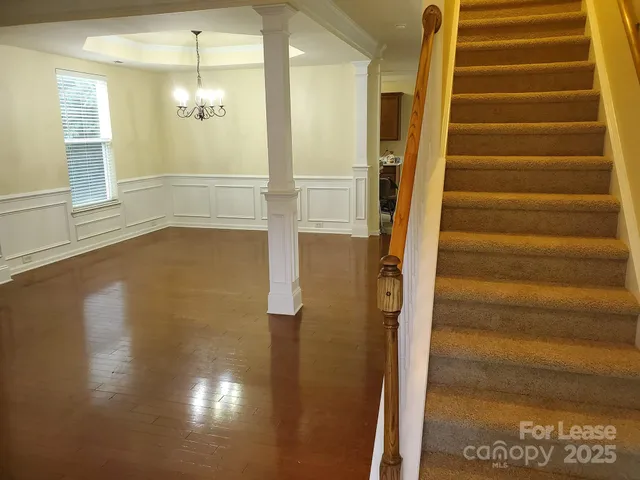 a view of an empty room with a bathroom