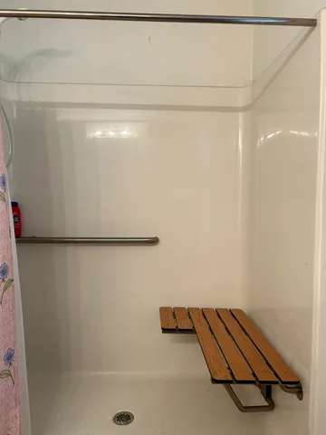 a view of a room with racks on the wall