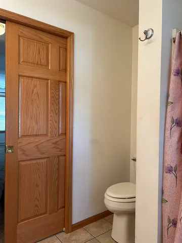 a bathroom with a toilet