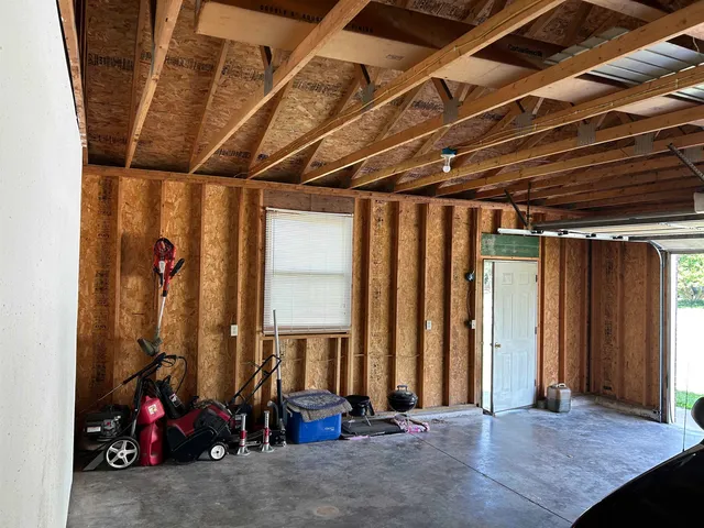 a view of room with clothes and shoes