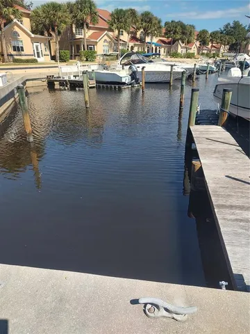 a view of a lake with boats