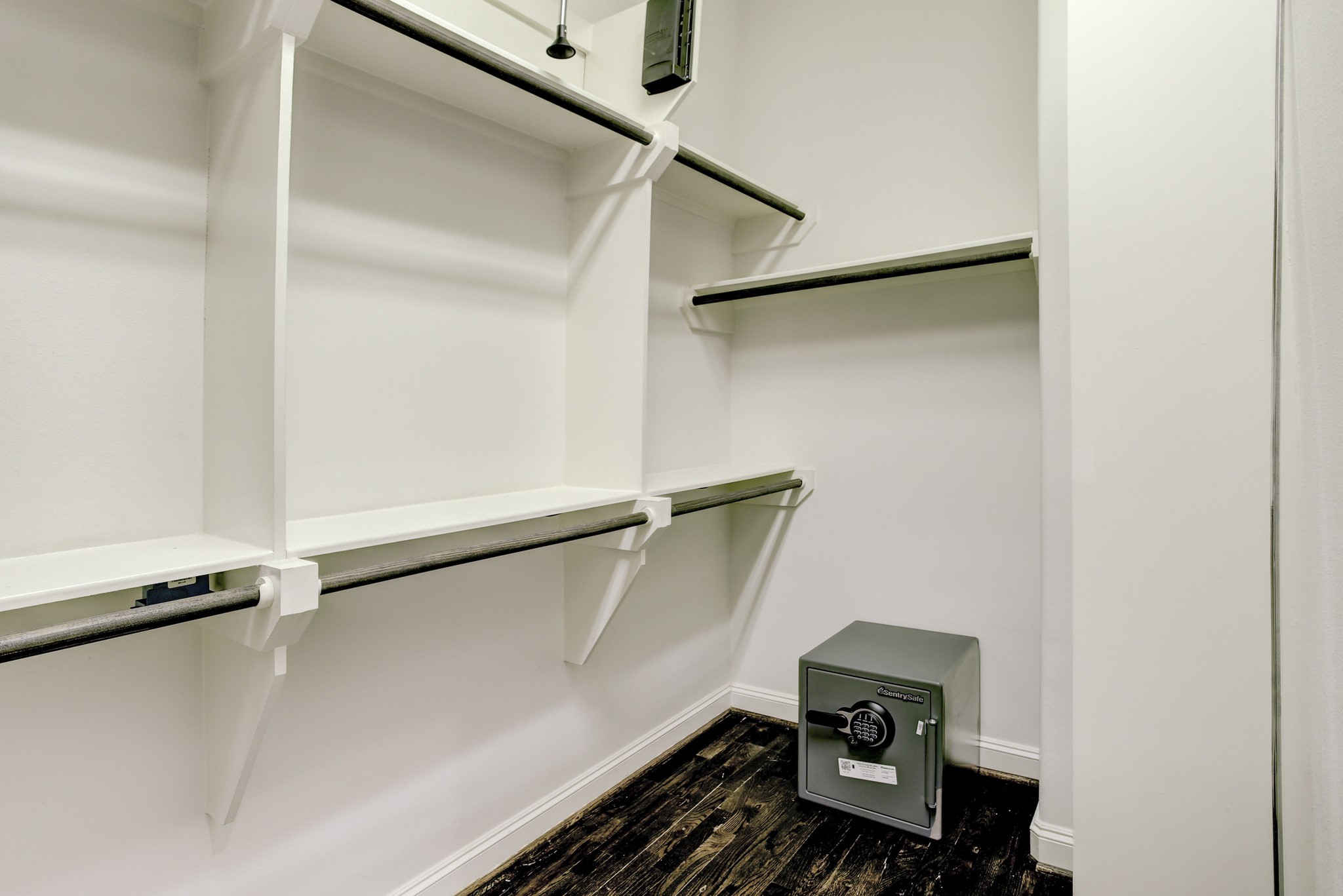 5506 Darling Street Houston, TX 77007 - Photo 14 of 23 The 1st Primary Closet is spacious and provides lots of clothes hanging space, plus there is a safe for valuables.