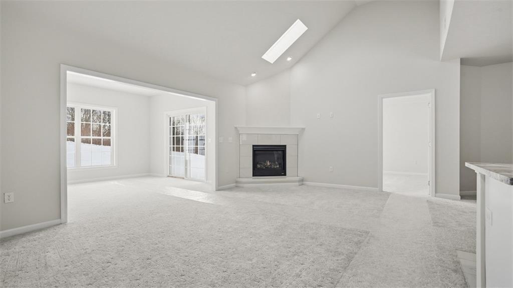 300 River Rdg Court Baden, PA 15005 - Photo 14 of 28 an empty room with windows and fireplace