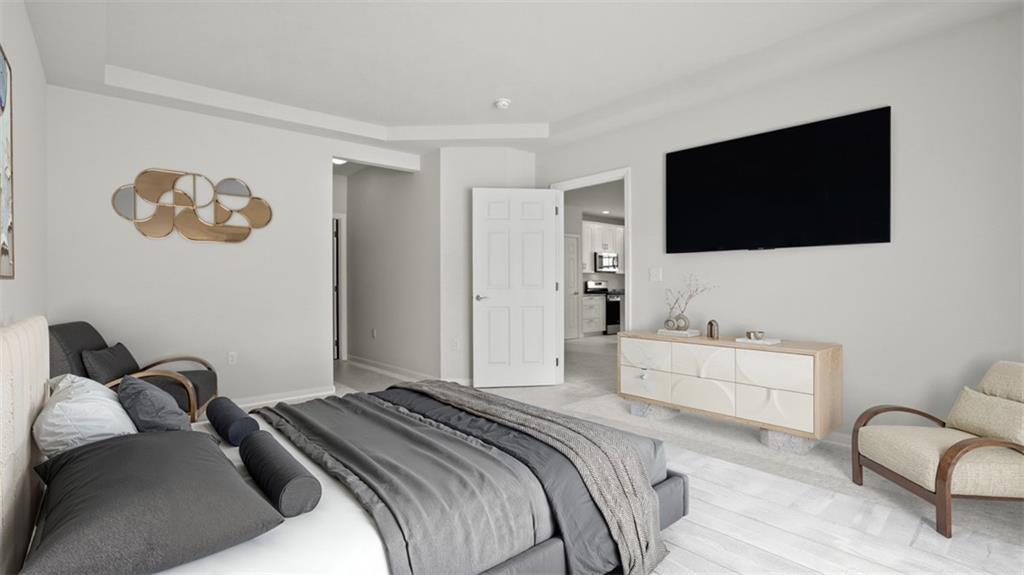 300 River Rdg Court Baden, PA 15005 - Photo 16 of 28 a bedroom with a bed and a flat screen tv