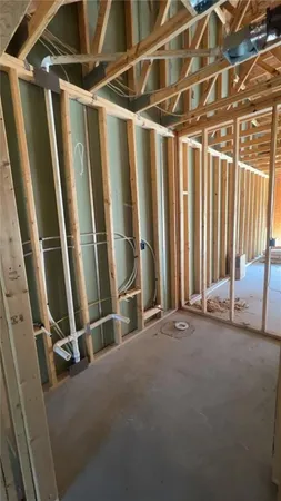 a view of an empty room with wooden frame