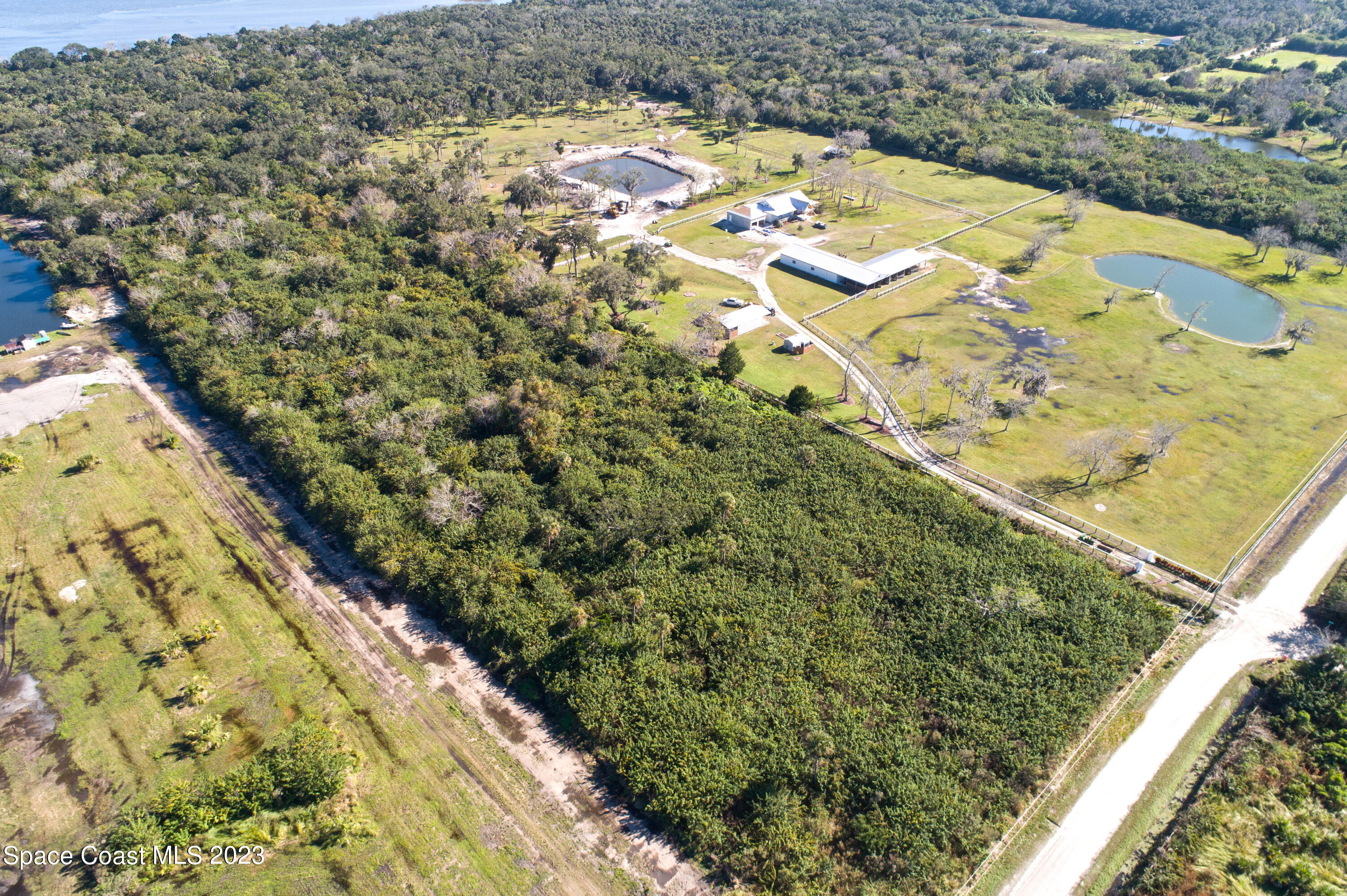 3495 Hammock Road Mims, FL 32754 - Photo 6 of 20 a view of outdoor space with wooden floor