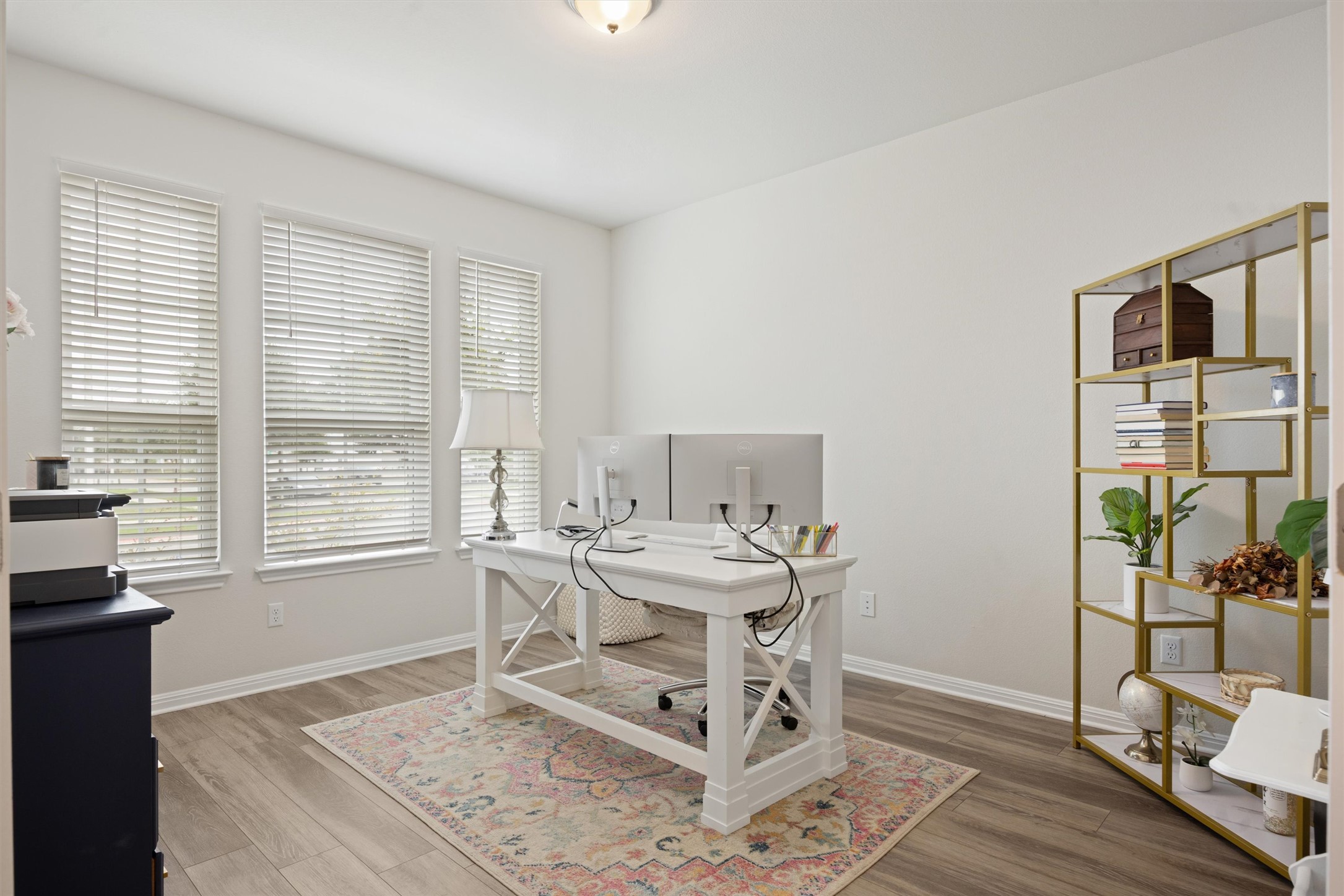 313 Toddy Way Leander, TX 78641 - Photo 6 of 39 Office area featuring light wood-style flooring and baseboards
