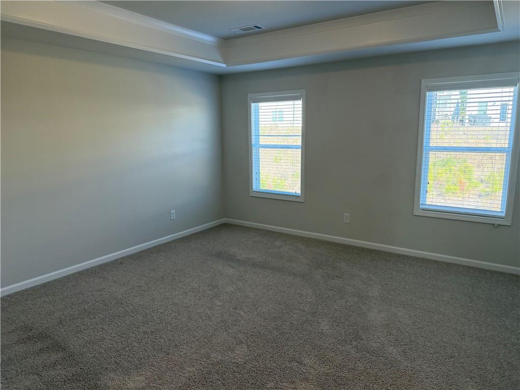 3772 Dover Run Lane Loganville, GA 30052 - Photo 17 of 36 an empty room with a window