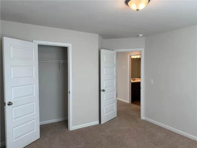 wooden floor and closet in a room