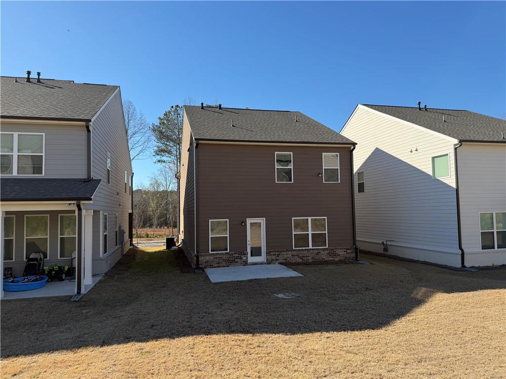 3772 Dover Run Lane Loganville, GA 30052 - Photo 32 of 36 a view of a house with a yard