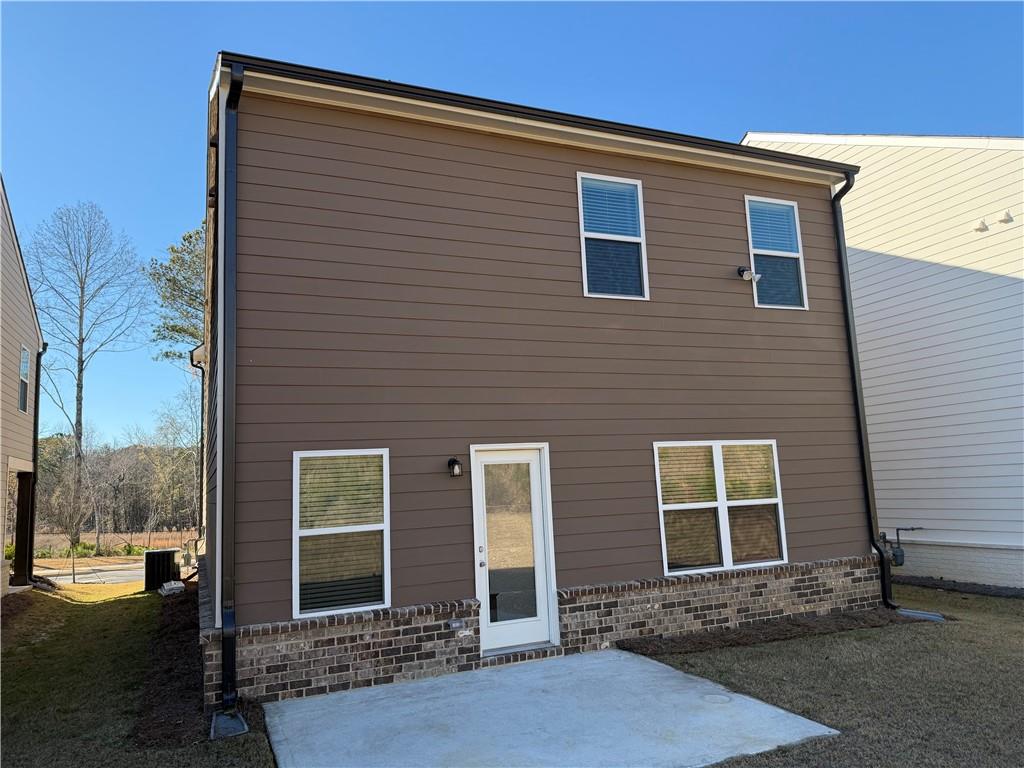 3772 Dover Run Lane Loganville, GA 30052 - Photo 33 of 36 a view of a house with a yard