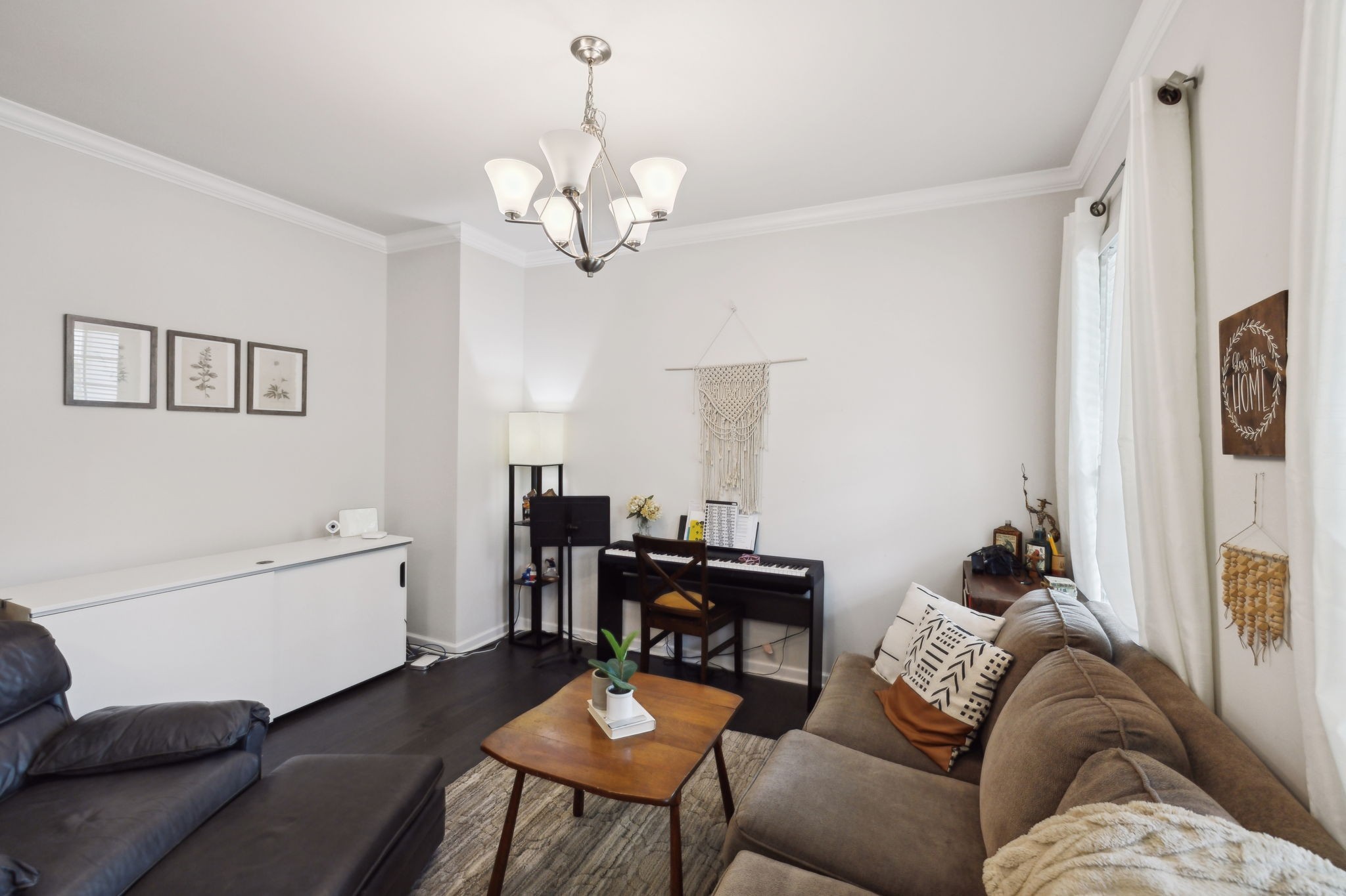 2030 Oglethorpe Drive Franklin, TN 37064 - Photo 11 of 54 a living room with furniture and a chandelier