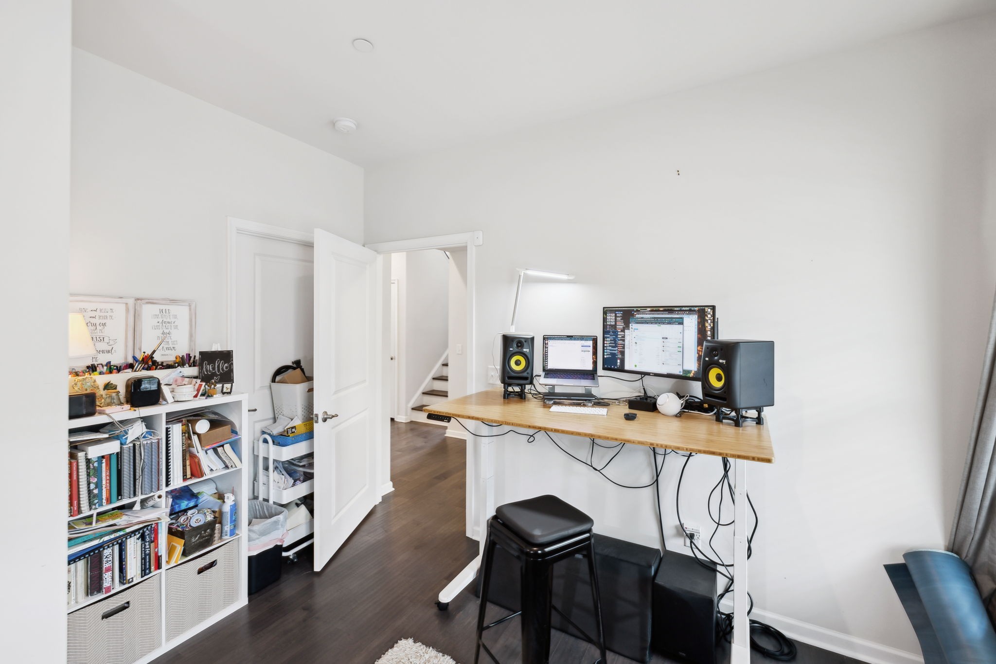 2030 Oglethorpe Drive Franklin, TN 37064 - Photo 13 of 54 a view of a workspace with furniture and a bookshelf