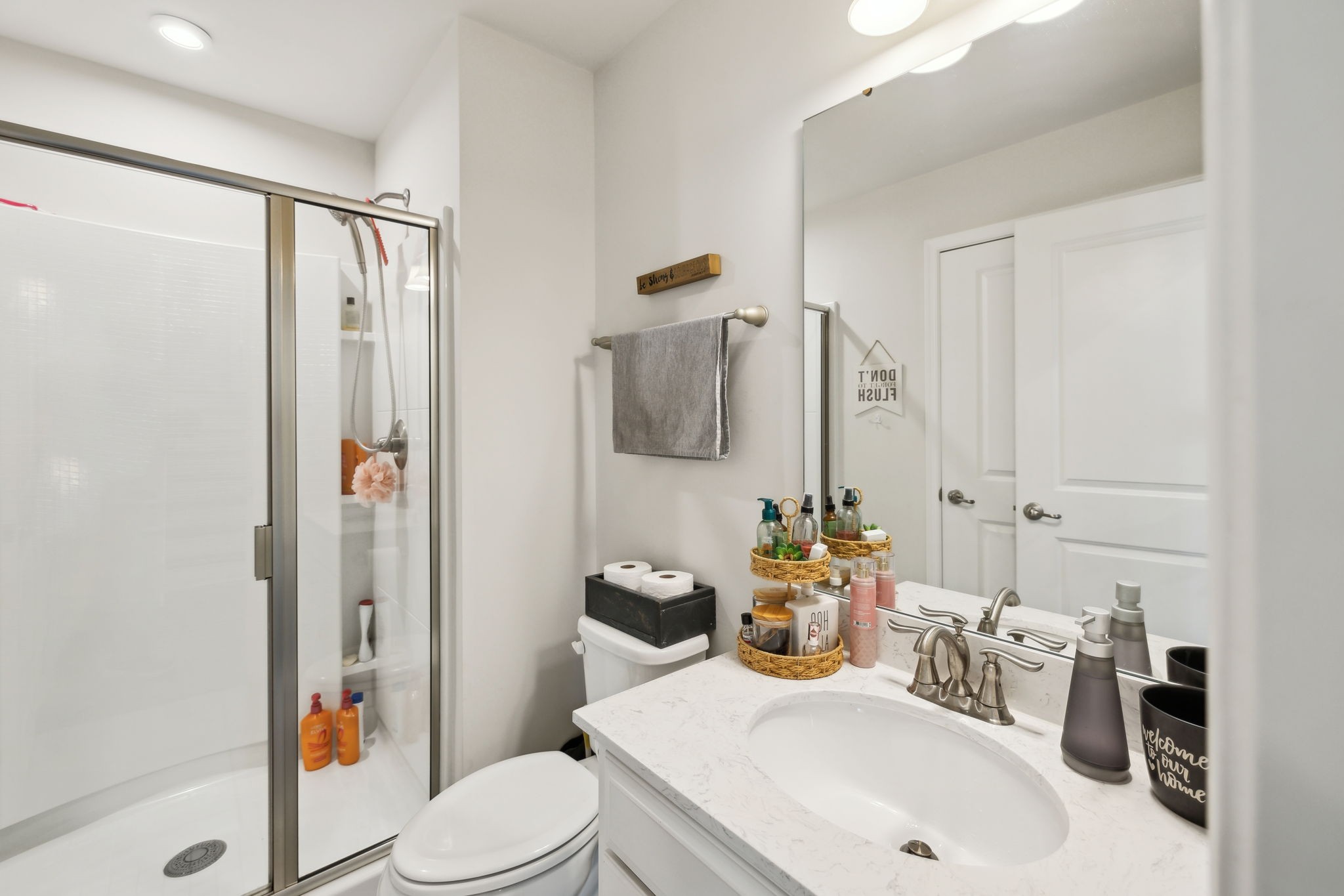 2030 Oglethorpe Drive Franklin, TN 37064 - Photo 14 of 54 a bathroom with a sink toilet and shower