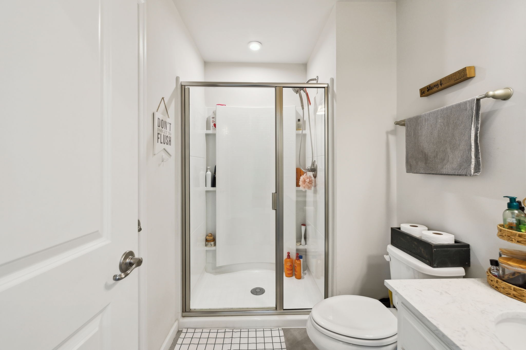 2030 Oglethorpe Drive Franklin, TN 37064 - Photo 15 of 54 a white toilet sitting next to a bathroom sink