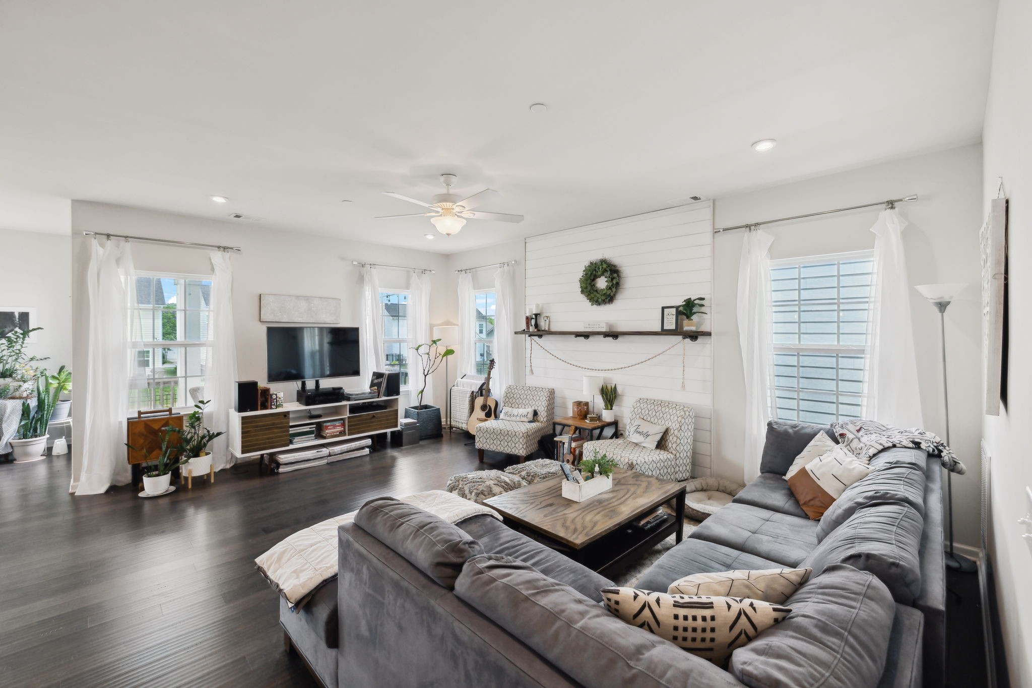 2030 Oglethorpe Drive Franklin, TN 37064 - Photo 16 of 54 a living room with furniture and a flat screen tv