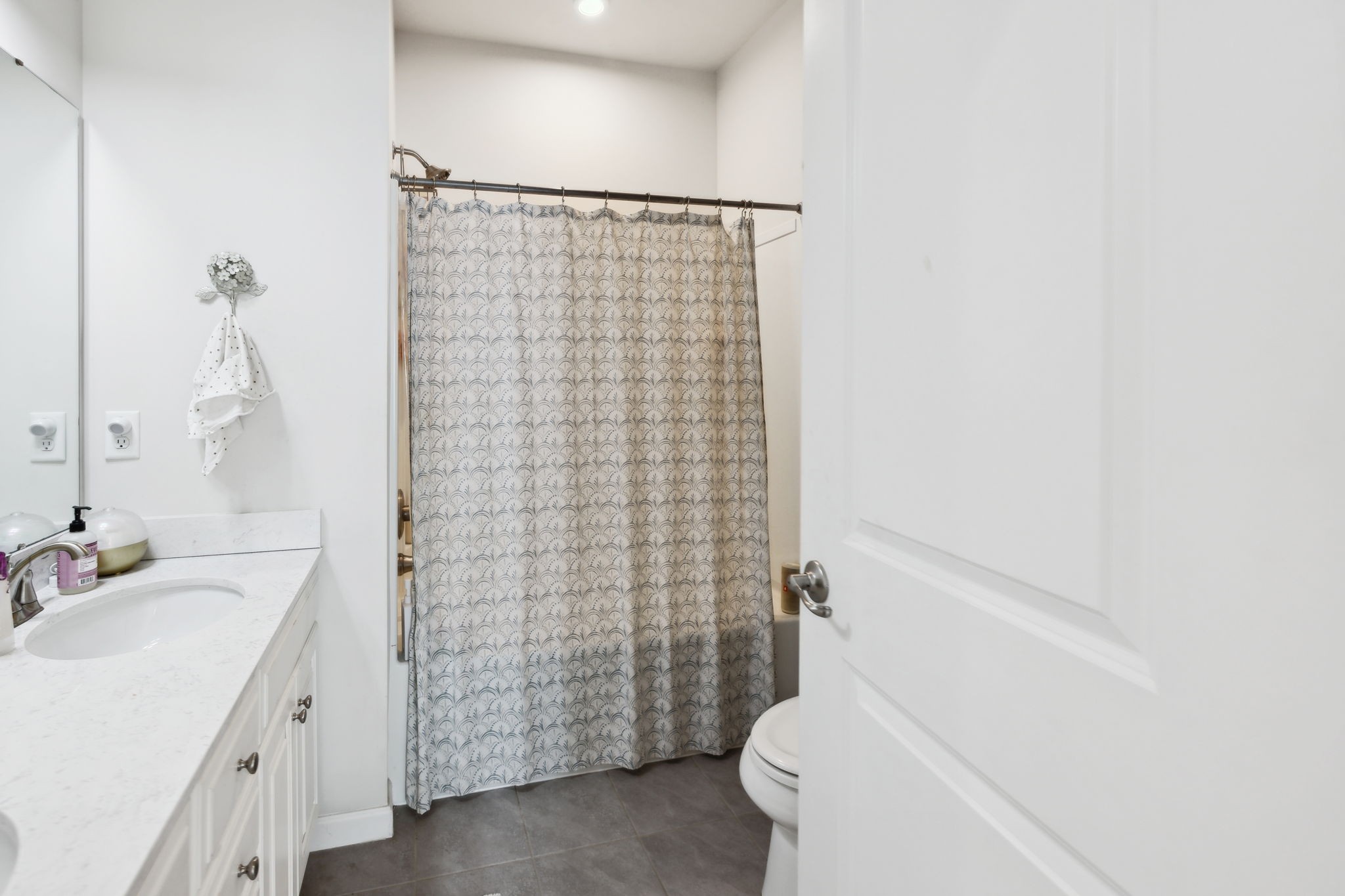 2030 Oglethorpe Drive Franklin, TN 37064 - Photo 33 of 54 a bathroom with a sink and a mirror