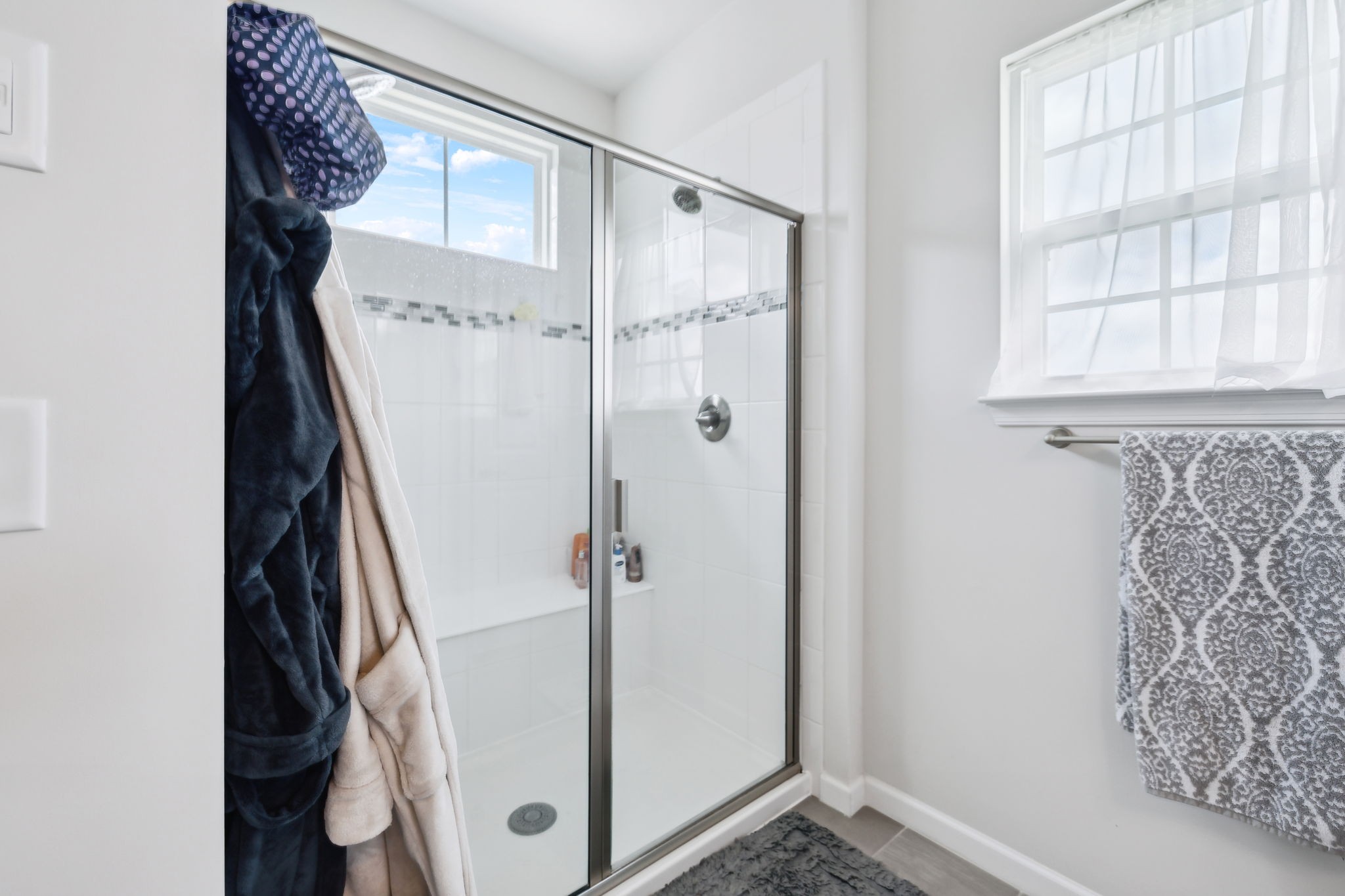 2030 Oglethorpe Drive Franklin, TN 37064 - Photo 46 of 54 a bathroom with a shower and a window
