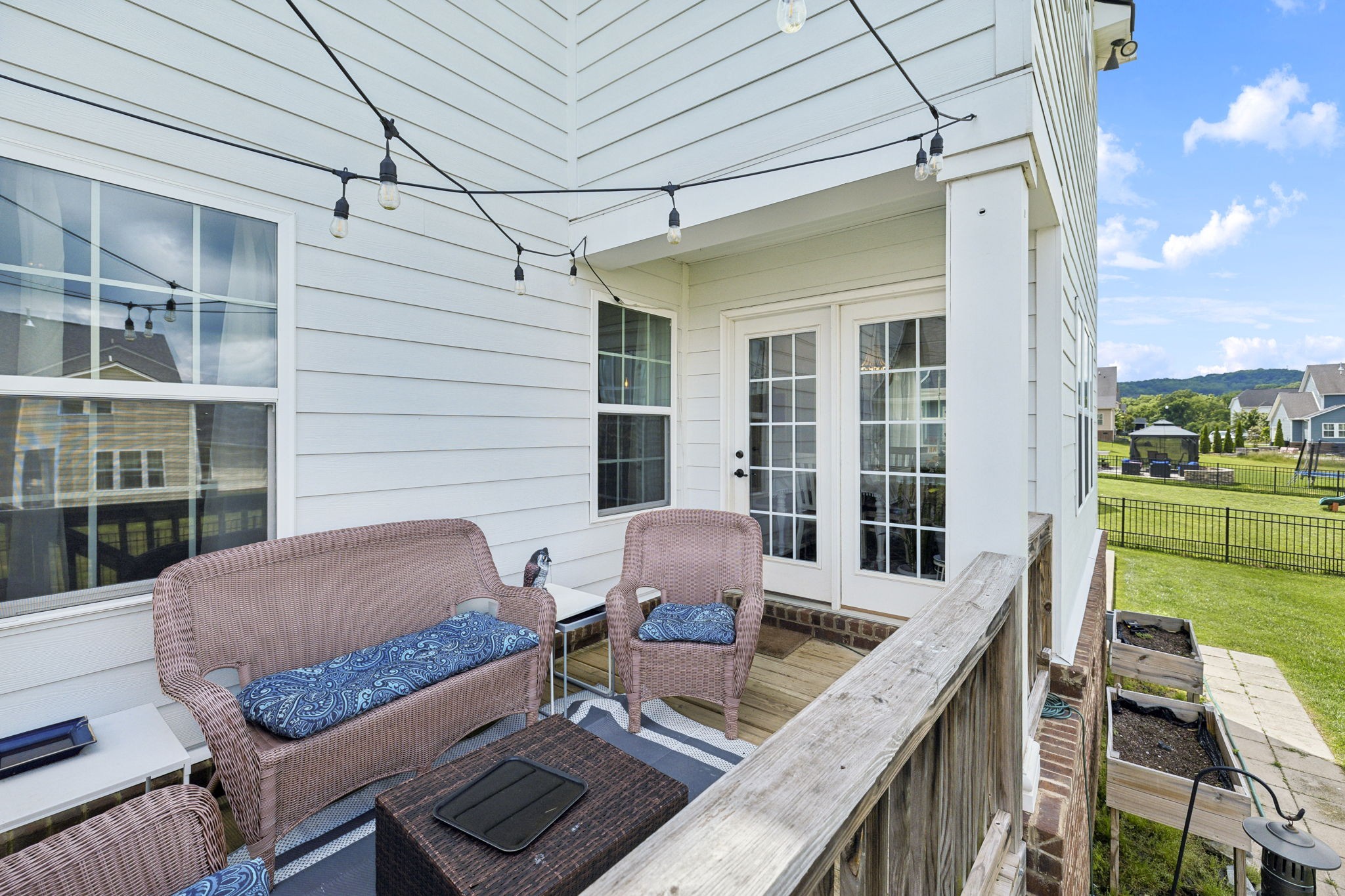 2030 Oglethorpe Drive Franklin, TN 37064 - Photo 49 of 54 a balcony with furniture and a potted plant