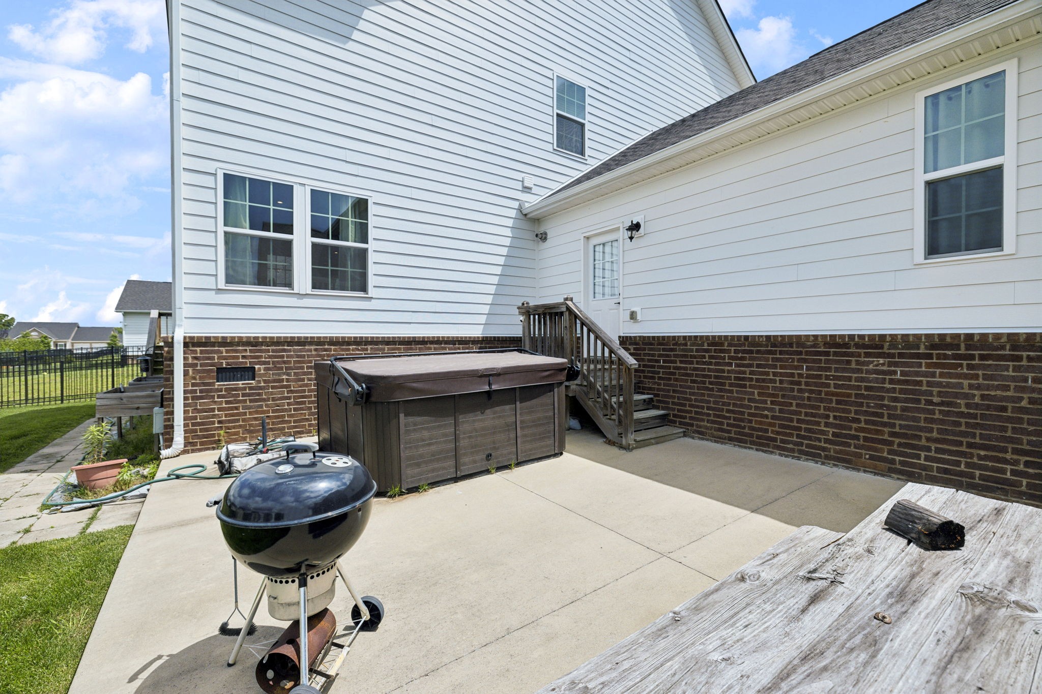 2030 Oglethorpe Drive Franklin, TN 37064 - Photo 54 of 54 a view of a patio with chairs and a potted plant