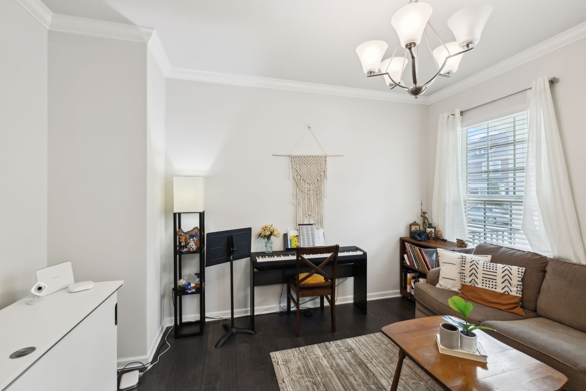 2030 Oglethorpe Drive Franklin, TN 37064 - Photo 9 of 54 a living room with furniture and a chandelier