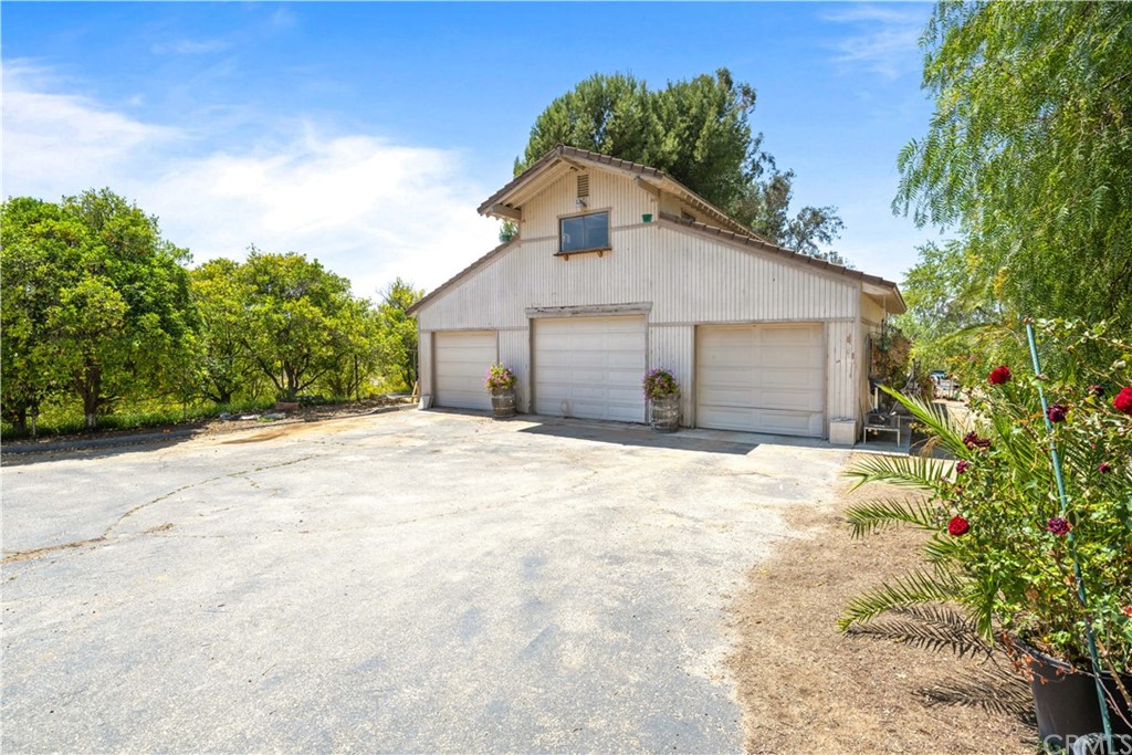 34970 Santa Rita Road Temecula, CA 92592 - Photo 15 of 38 a view of a house with a yard