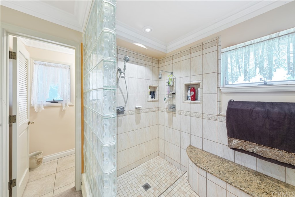 34970 Santa Rita Road Temecula, CA 92592 - Photo 32 of 38 a bathroom with a shower