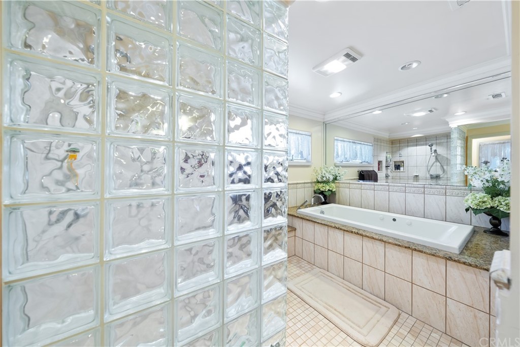 34970 Santa Rita Road Temecula, CA 92592 - Photo 33 of 38 a large kitchen with kitchen island a large window a sink and a counter space