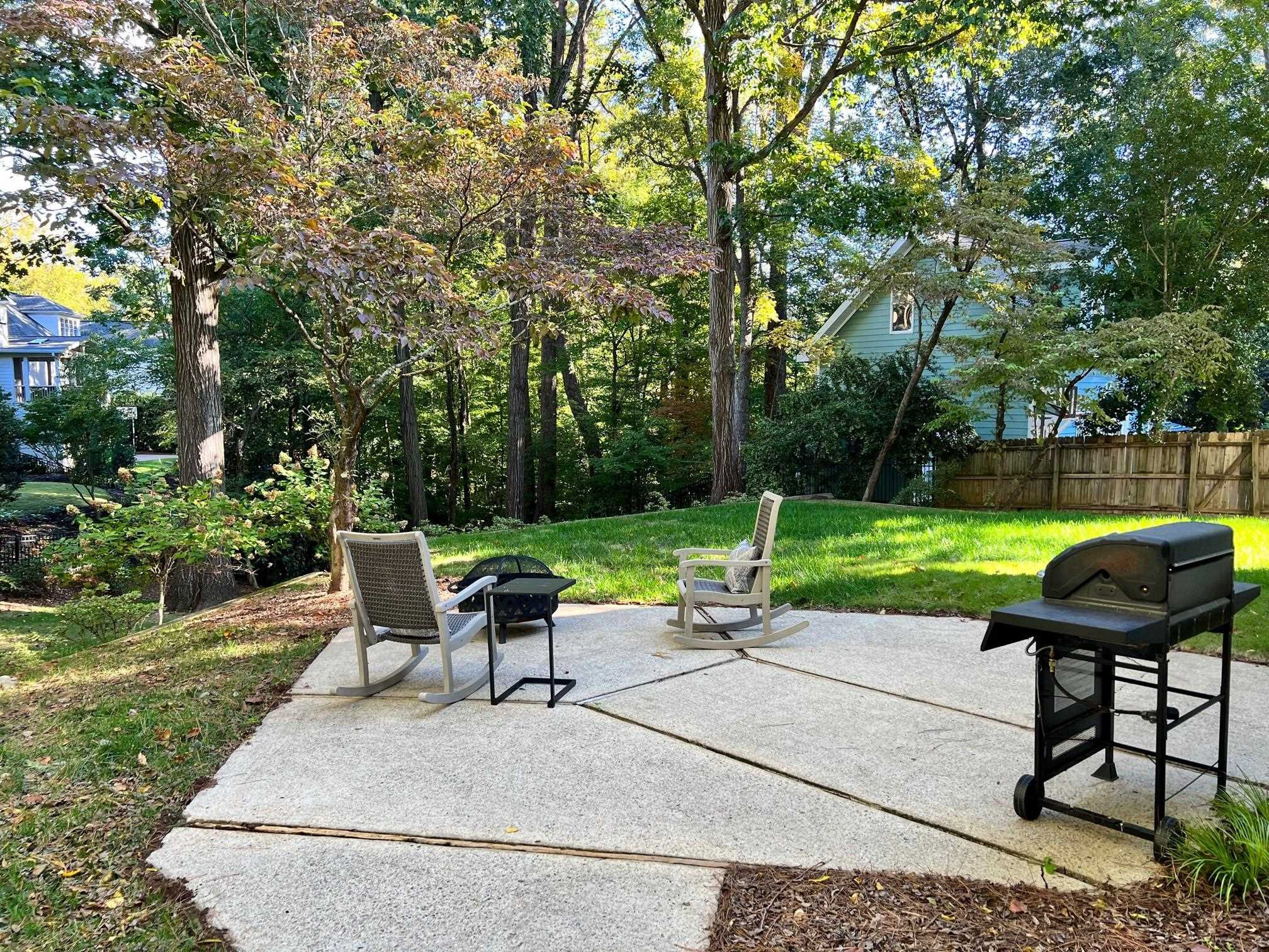 208 Walden Place Raleigh, NC 27609 - Photo 4 of 4 a view of a park with bench and garden