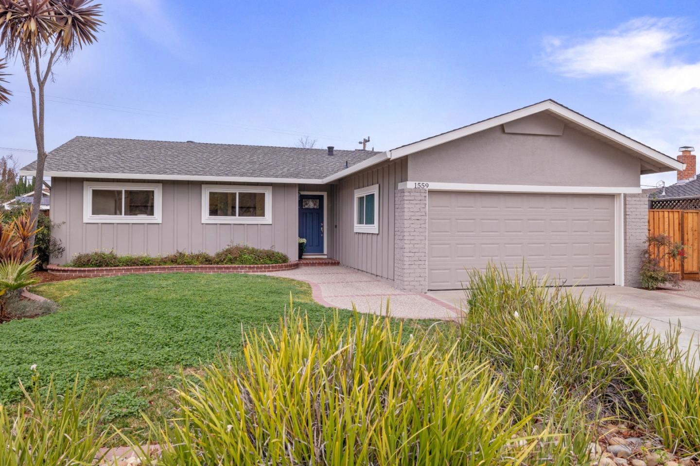 1559 Nuthatch Lane Sunnyvale, CA 94087 - Photo 1 of 1 a front view of house with yard and green space