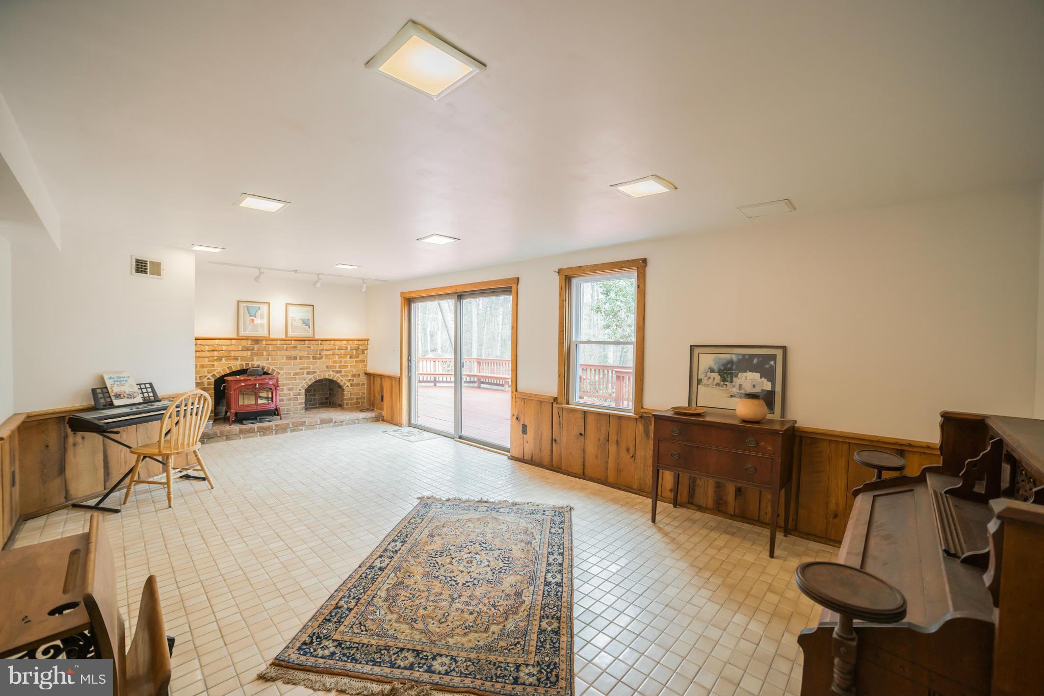 10831 Kingstead Road Damascus, MD 20872 - Photo 26 of 29 Wood stove keeps your utility bills manageable!