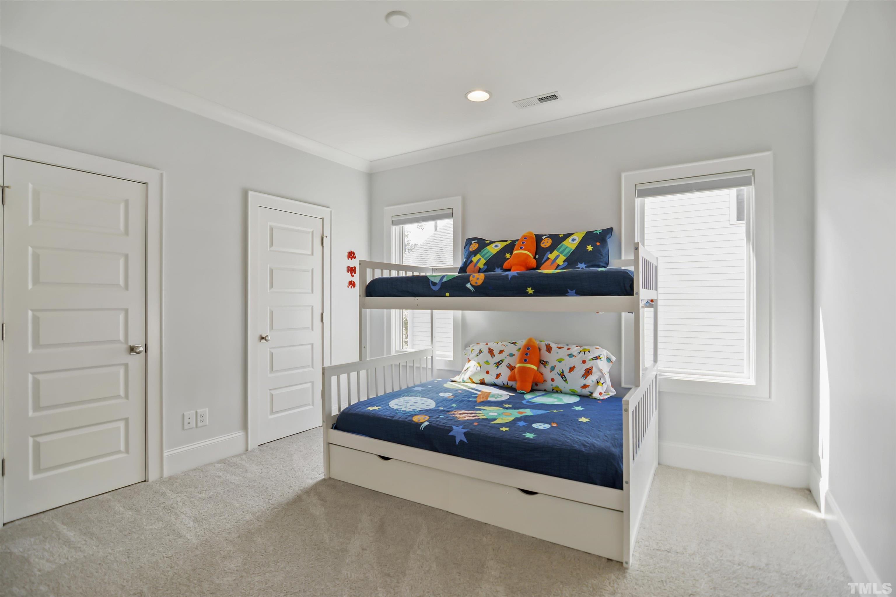 1012 Canterbury Road Raleigh, NC 27607 - Photo 24 of 51 a living room with furniture and a flat screen tv